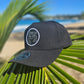 Gorra de tela negra "Coqui taino blanco y negro"